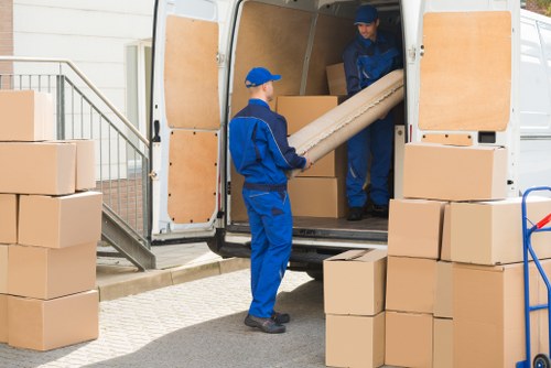 Packed office equipment ready for transport during a Harringay business move