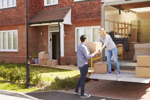 Removal team pricing a move in Harringay residential street