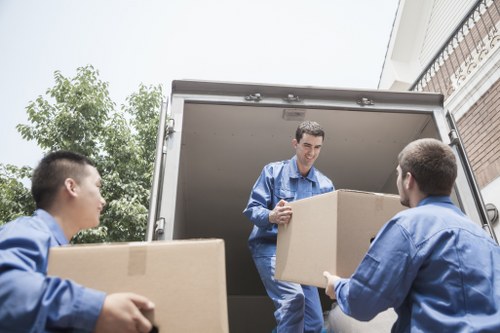 Man and van loading furniture on a Harringay residential street