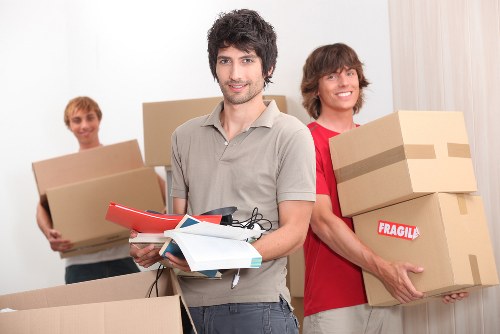 Packed office furniture and boxes ready for relocation
