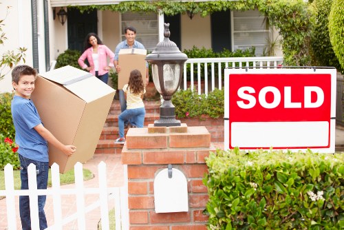 Professional movers preparing furniture for a Harringay home relocation